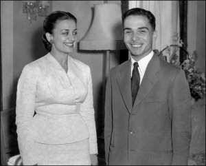 Queen Dina of Jordan and her husband Hussein Ibn Talal, King of Jordan, 20, smile as they pose for the photographer in their London hotel suite. King of Jordan came to power 02 May 1953 and married Princess Dina in 1955 but their marriage was dissolved. (Photo by JOHN EGGITT / AFP) (Photo credit should read JOHN EGGITT/AFP/Getty Images)